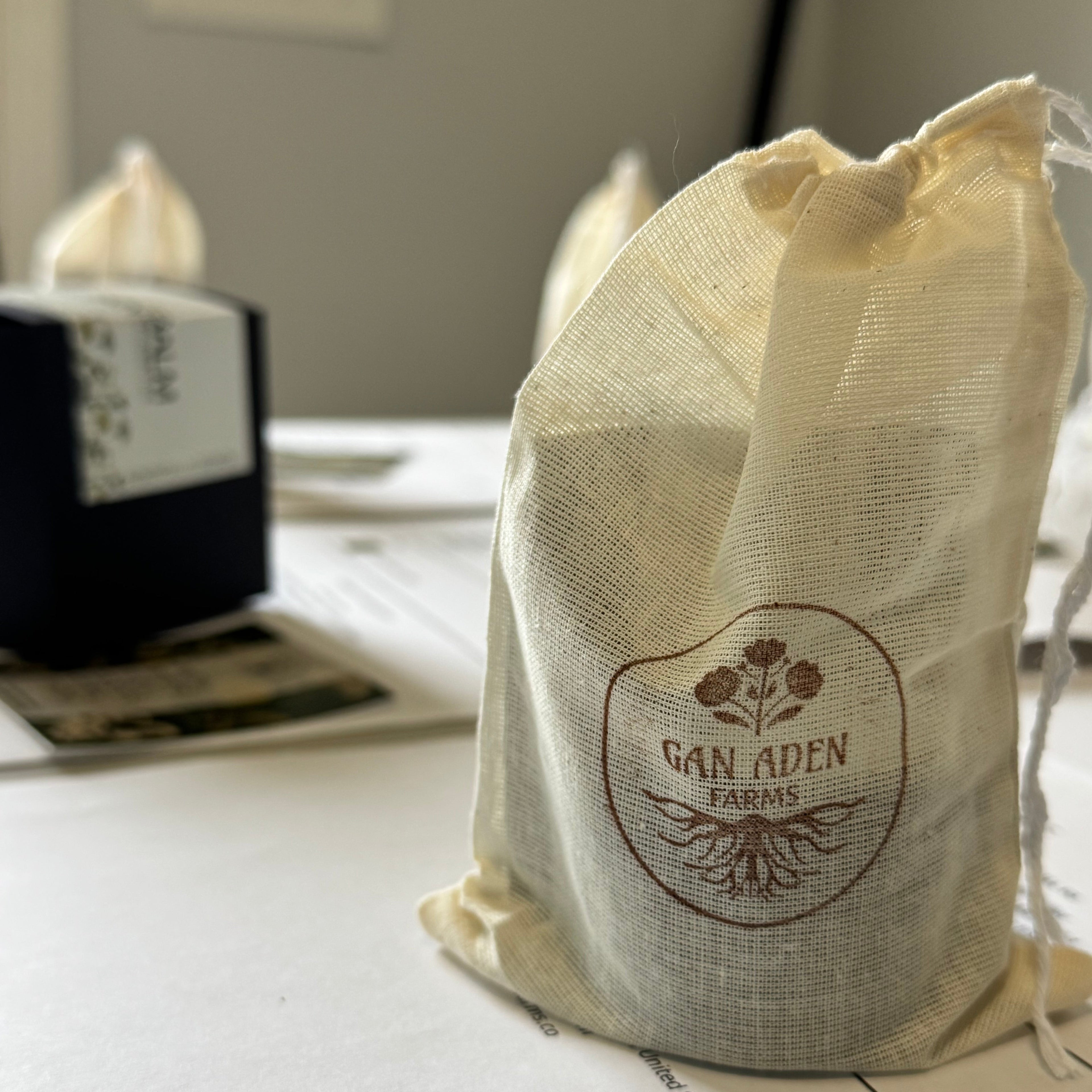 White cotton bag of tallow with a logo