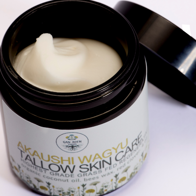 Skincare product jar with cream on a white background